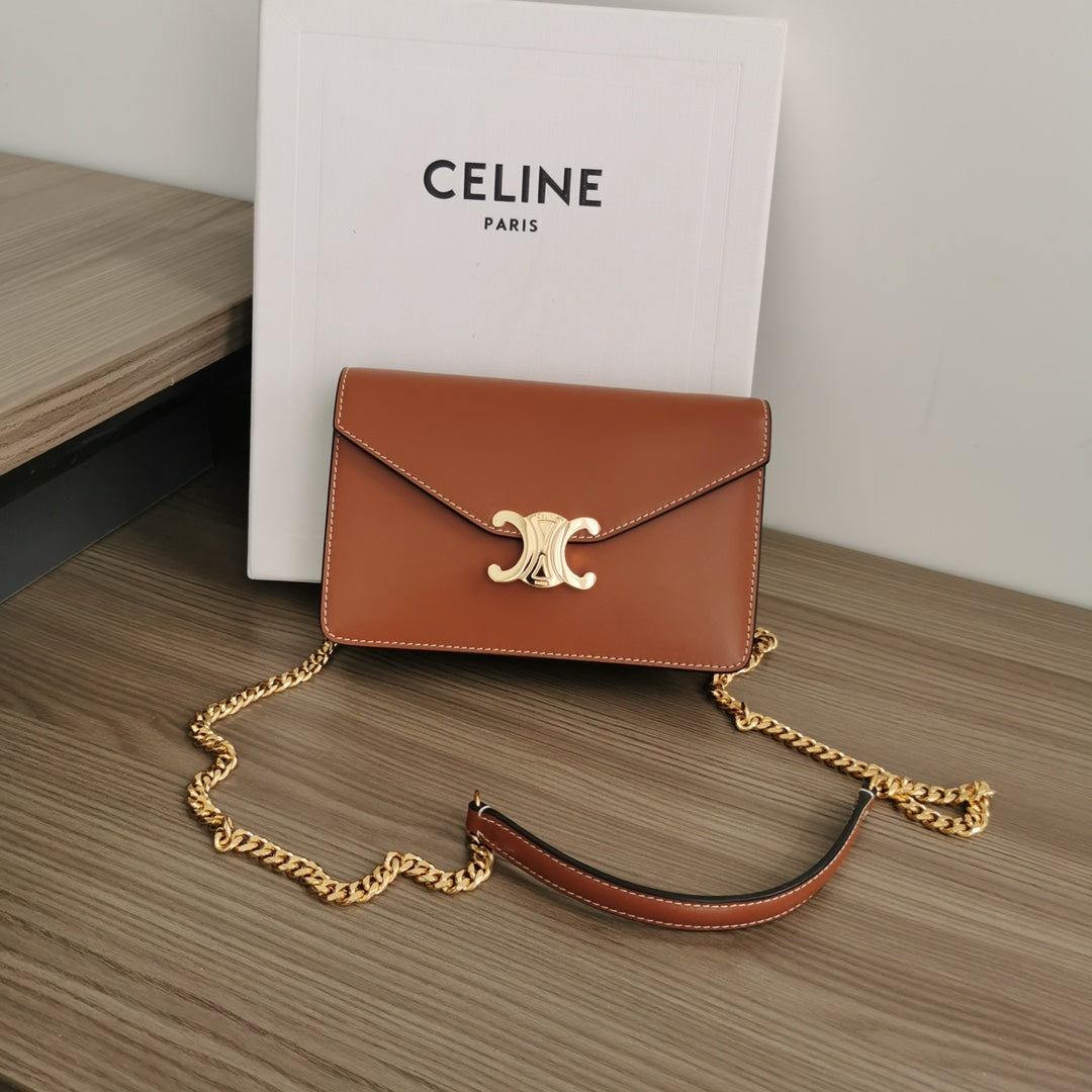 WALLET ON CHAIN MARGO 19 IN RUST ORANGE SMOOTH CALFSKIN GOLD HARDWARE