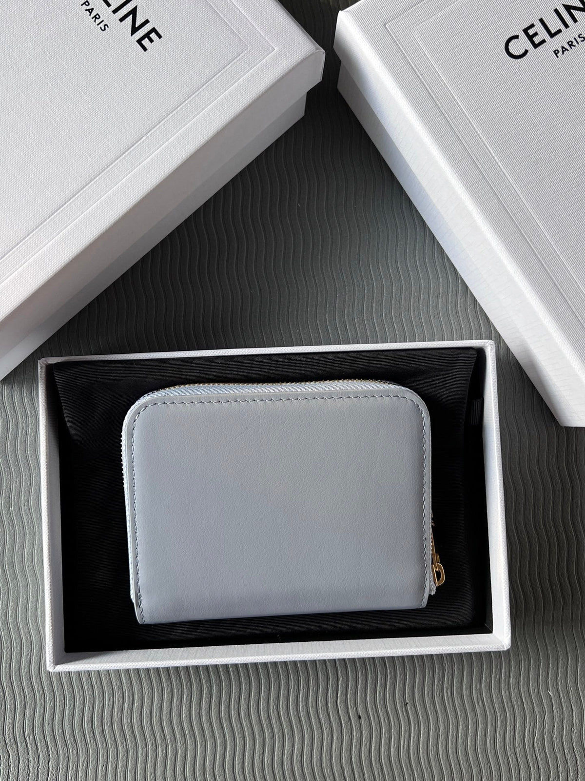TRIOMPHE Compact Zipped Wallet Glacier Cowhide Leather