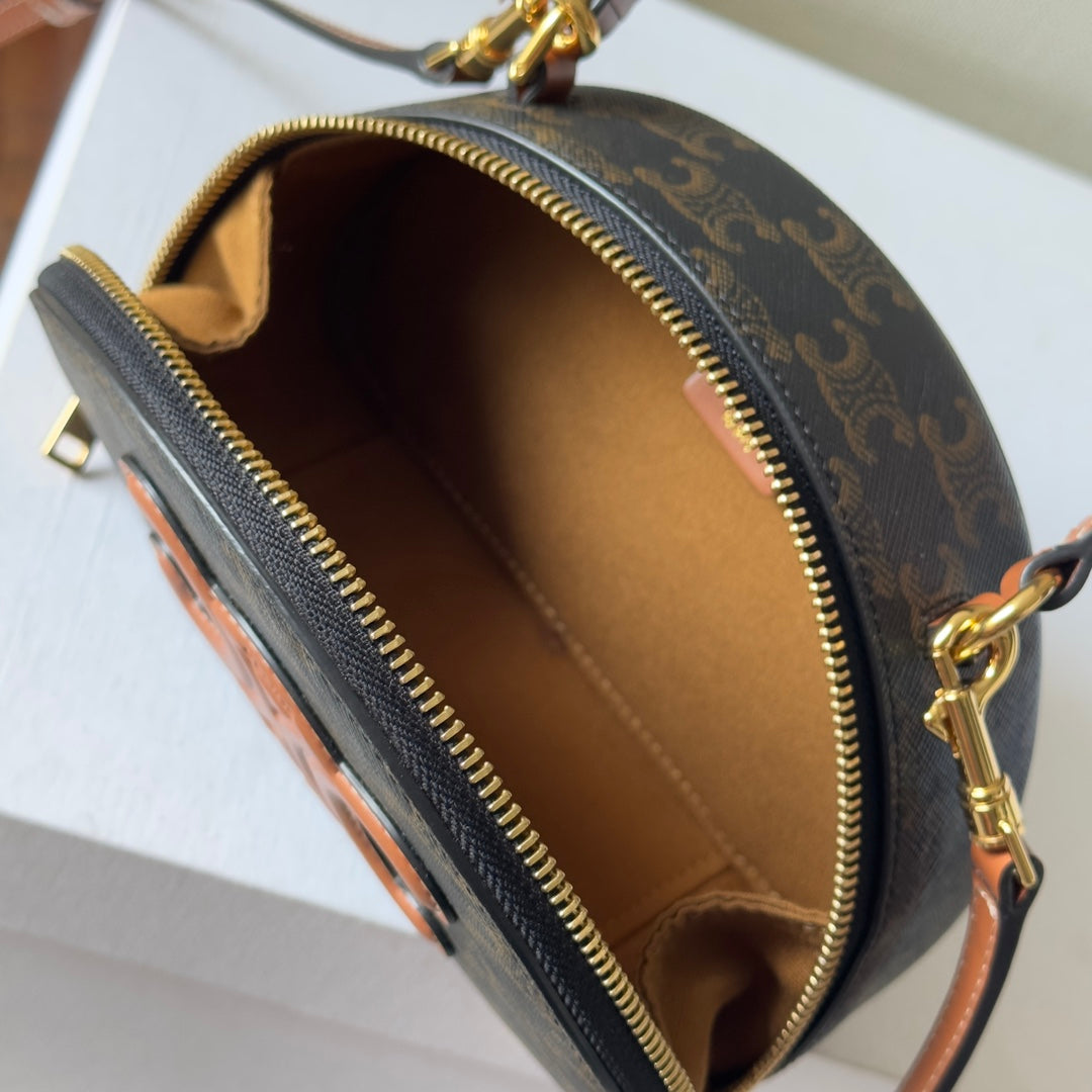 HALF MOON CASE 18 IN BLACK TRIOMPHE CANVAS AND BRONZE BROWN CALFSKIN
