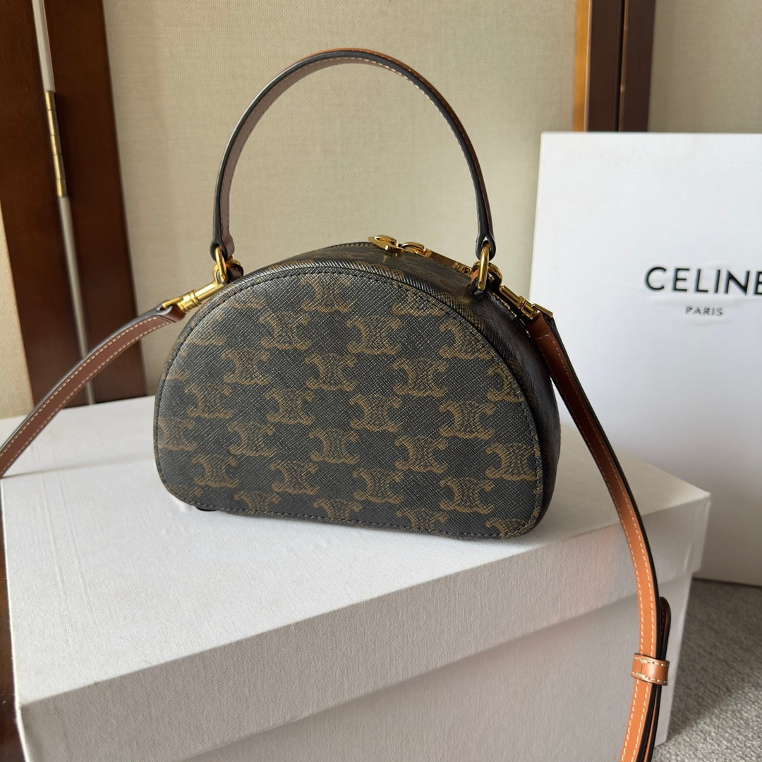 HALF MOON CASE 18 IN BLACK TRIOMPHE CANVAS AND BRONZE BROWN CALFSKIN