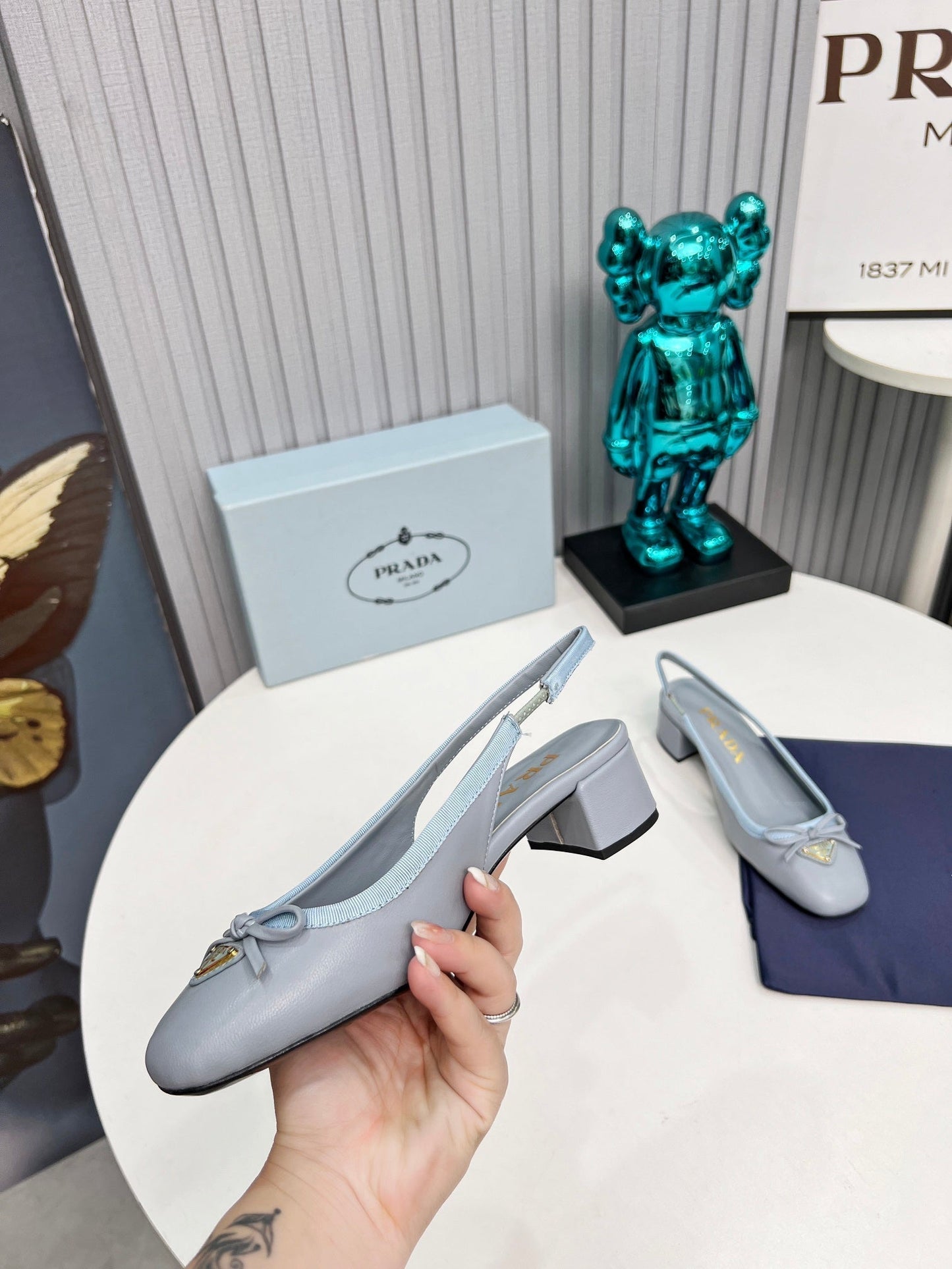 Prada 26s Round Toe Slingback Pumps 40mm In Light Blue Calfskin With Bow