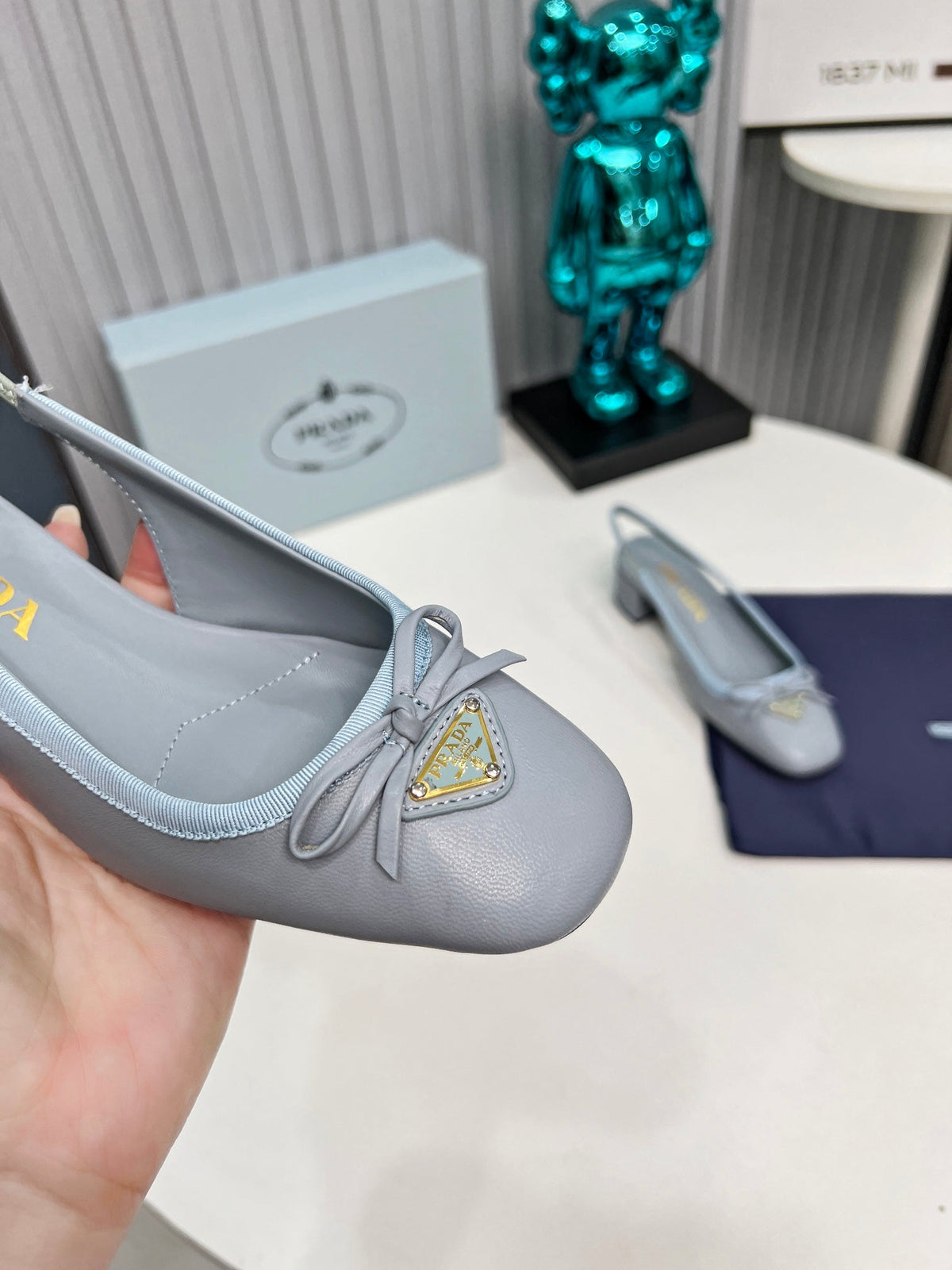 Prada 26s Round Toe Slingback Pumps 40mm In Light Blue Calfskin With Bow