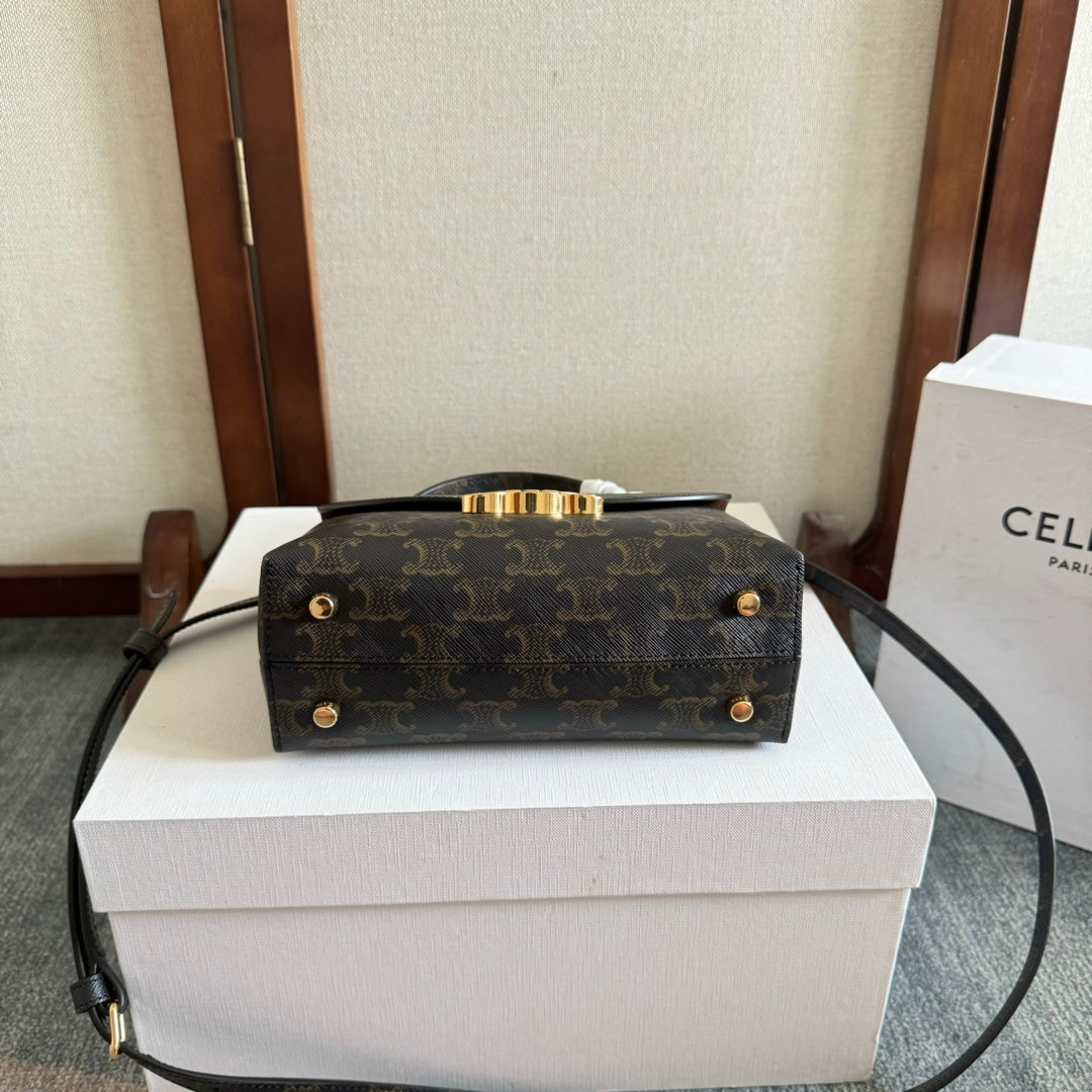 TEEN NINO BAG 20 IN BLACK TRIOMPHE CANVAS GOLD HARDWARE