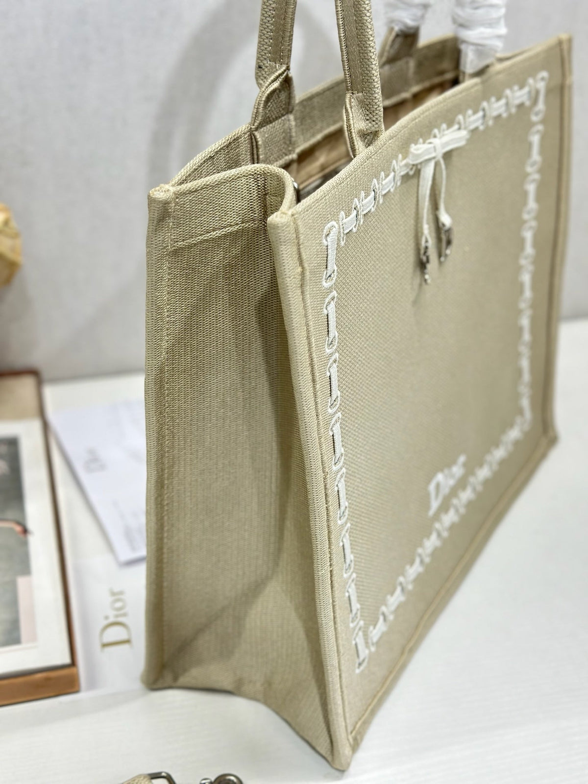 CD Book Tote Beige Embroidery and White Woven Grosgrain Ribbon