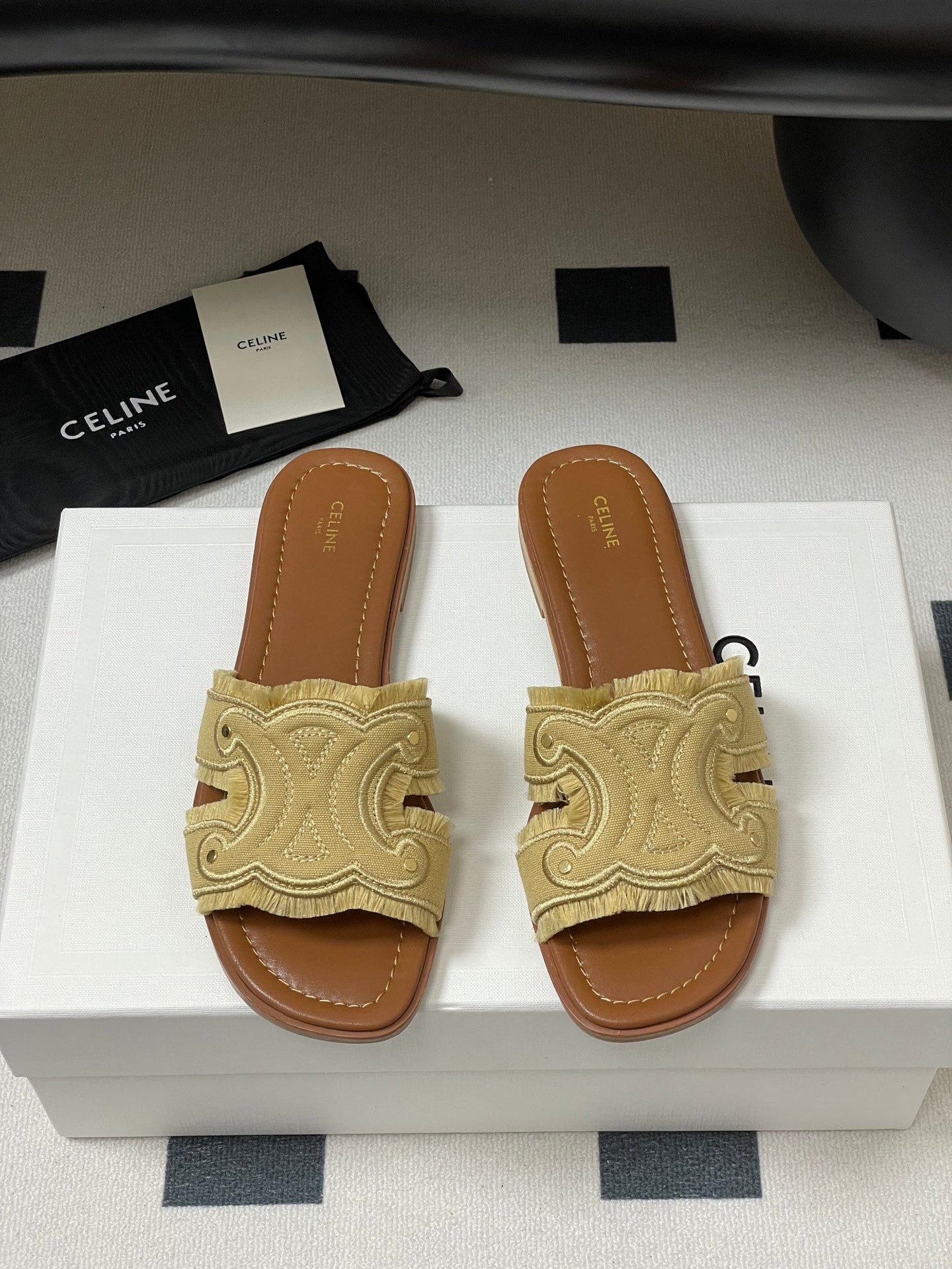 CL Marina Fringed Flat Mule In Caramel Denim 319735