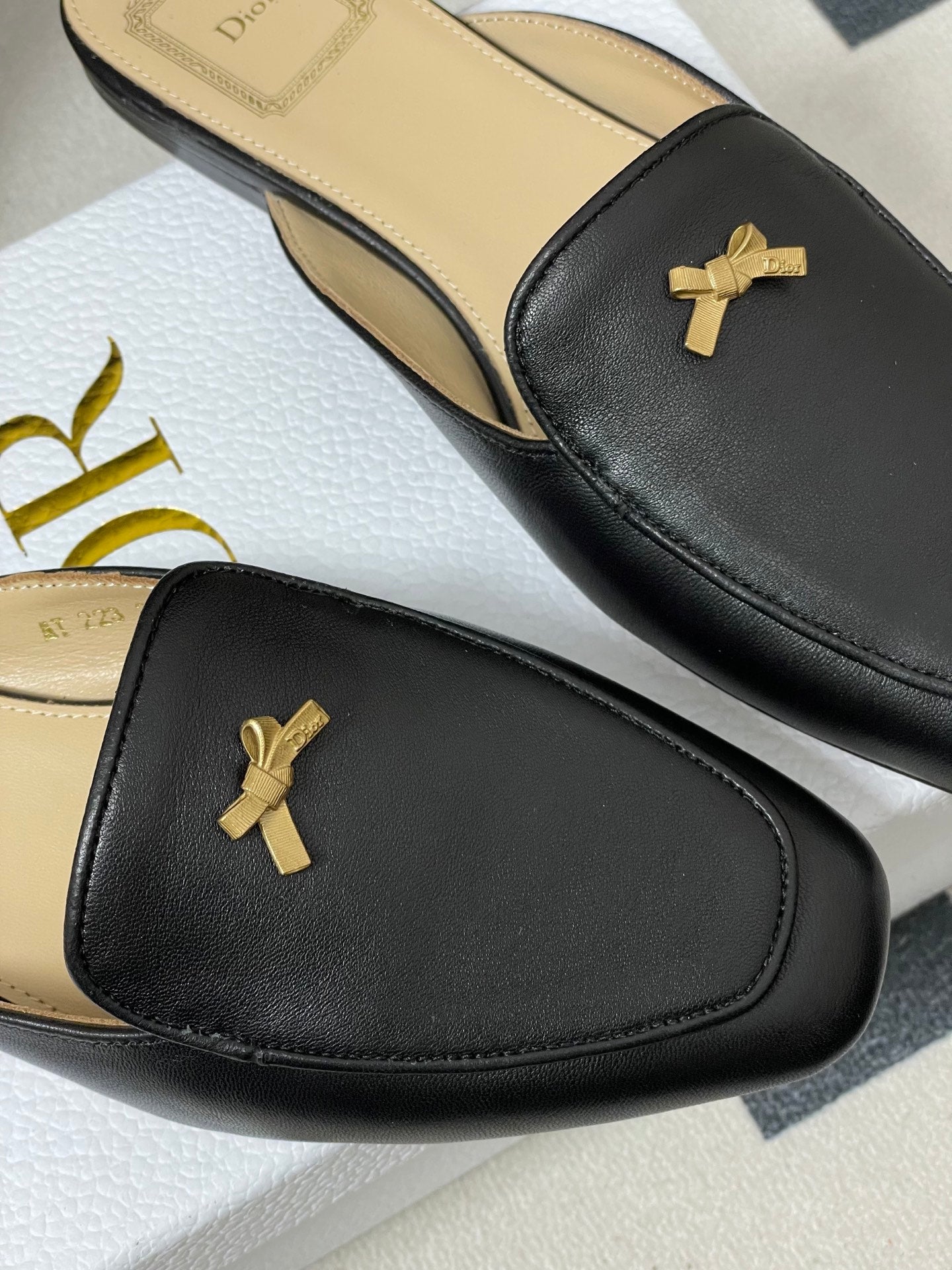CD 26 Baby Bow Flat Mule Black Cowhide Sheepskin 632597