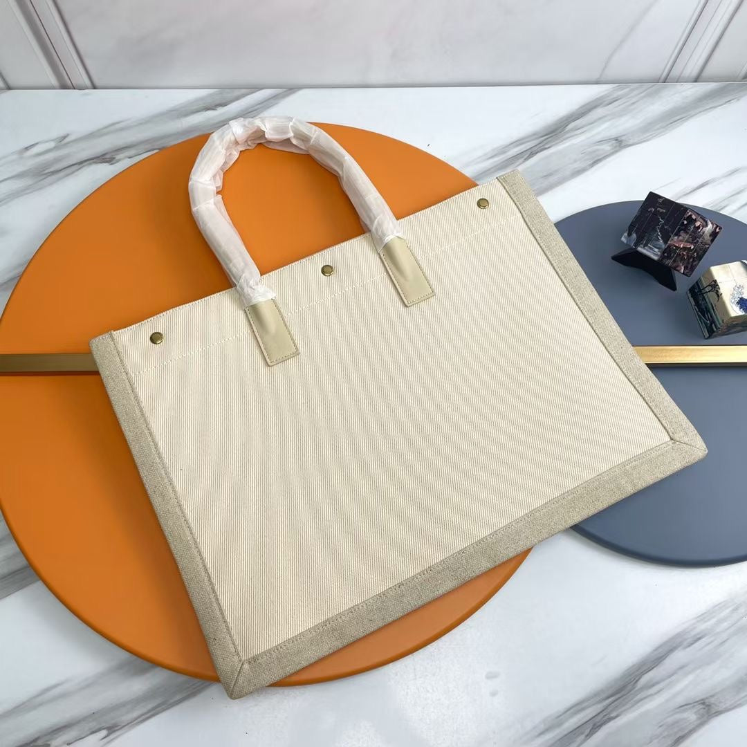Rive Gauche Tote Ivory Canvas Leather Trim 286036